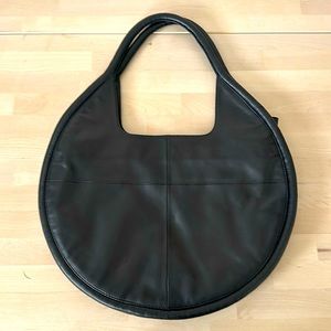 Round, genuine leather, black shoulder bag by Anthropology.